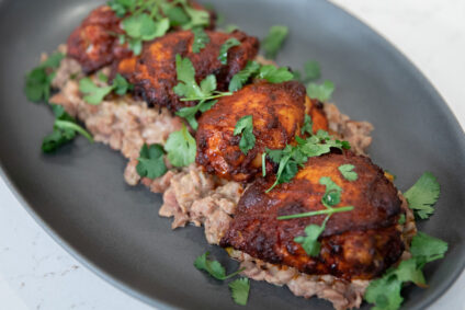 Roasted Achiote Chicken Thighs with Stewed Beans