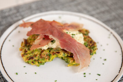 Zucchini Fritters with Crispy Prosciutto and Curried Yogurt Sauce