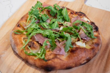 Pear, Goat Cheese, Prosciutto, Walnut Pizza